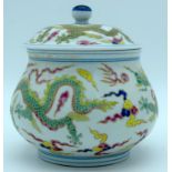 A Chinese Wucai Jar and cover decorated with Dragons 17cm (2).