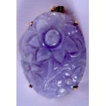 AN EARLY 20TH CENTURY CHINESE 14CT GOLD MOUNTED LAVENDER JADEITE PENDANT. 3.5 cm x 2.5 cm.