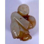 AN EARLY 20TH CENTURY CHINESE CARVED GREEN JADE FIGURE OF A BOY Late Qing. 4 cm x 2.5 cm.