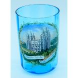 A small porcelain enamel glass depicting a Mormon temple Salt lake city 10cm.