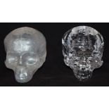 Two contemporary Swedish glass skulls possibly candle holders 12 x 9 cm
