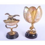 A 19TH CENTURY FRENCH PALAIS ROYALE MOTHER OF PEARL EAGLE DISH together with a similar candlestick.