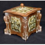 A Art Nouveau copper and brass lidded box 16cm.