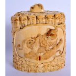 A FINE 19TH CENTURY JAPANESE MEIJI PERIOD CARVED IVORY BOX AND COVER decorated with elephants and ma