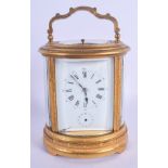 A GOOD 19TH CENTURY FRENCH GILT BRONZE REPEATING CARRIAGE CLOCK decorated with foliage and vines. 20