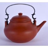 AN EARLY 20TH CENTURY CHINESE YIXING POTTERY TEAPOT AND COVER Late Qing, bearing Kangxi marks to bas