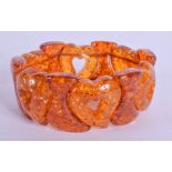 AN AMBER BRACELET. 56 grams. 22 cm long.