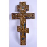 AN 18TH CENTURY RUSSIAN ENAMELLED BRONZE CRUCIFIX decorated with Cyrillic script. 28 cm x 13.5 cm.