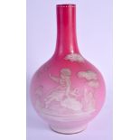 A LATE VICTORIAN PINK OPALINE GLASS VASE enamelled with a girl seated beside butterflies. 24 cm high