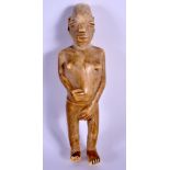 A 19TH CENTURY AFRICAN TRIBAL CARVED IVORY FIGURE OF A FEMALE possibly a medicine doll. 18 cm high.