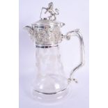 A SILVER PLATED GLASS CLARET JUG. 28 cm high.