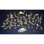A large collection of brass animals, people and a toilet. (Qty)