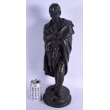 A LARGE 19TH CENTURY EUROPEAN SPELTER FIGURE OF A MAN modelled holding flowers. 49 cm high.