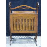 An Art Deco oak magazine rack 72 x 48 cm.