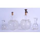 A PAIR OF 19TH CENTURY GLASS DECANTERS together with a pair of Richardson's patent ½ gill bottles. L