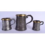 THREE LARGE 19TH CENTURY PEWTER IMPERIAL MEASURE SHIPS HOTEL MARITIME MUGS. Largest 18 cm high. (3)