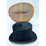 A Cased Cunningham and Co Top Hat . (2)