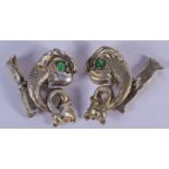 A PAIR OF CONTINENTAL SILVER GILT ENAMEL AND GREEN STONE FISH CUFFLINKS. 29 grams. 2.5 cm x 1.5 cm.