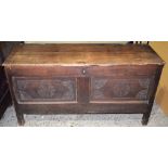 An 18th Century oak Coffer with engraved concentric carved pattern 126 x 64 cm.