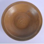 A CHINESE LONGQUAN CELADON TWIN FISH DISH Yuan/Ming. 19 cm diameter.