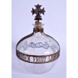 AN UNUSUAL EARLY 20TH CENTURY NEW YORK FORBIDDEN FRUIT LIQUEUR DECANTER with cross finial. 19 cm x 1