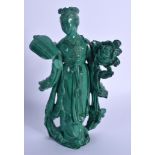 AN EARLY 20TH CENTURY CHINESE CARVED MALACHITE FIGURE OF GUANYIN Late Qing, modelled holding floral