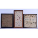 THREE 19TH CENTURY FRAMED EMBROIDERED SAMPLERS. Largest sampler 30 cm square. (3)