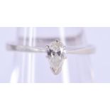 A 14CT GOLD AND 0.3 CT MARQUISE DIAMOND RING. K/L. 2 grams.