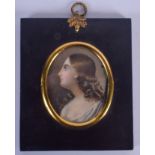 A FINE 19TH CENTURY CONTINENTAL PAINTED IVORY PORTRAIT MINIATURE depicting a pretty female. Image 7.