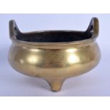 AN 18TH CENTURY CHINESE TWIN HANDLED BRONZE CENSER Qing, bearing Xuande marks to base, of plain form