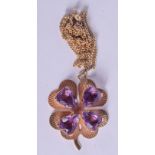 A 14CT GOLD AMETHYST SHAMROCK NECKLACE. 9 grams. 38 cm long, pendant 3.5 cm x 3 cm.