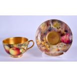 A ROYAL WORCESTER CUP AND SAUCER painted with fruit by Ayrton and Moseley, signed, date for 1934. Sa