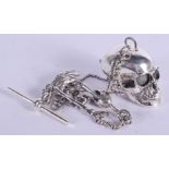 A SILVER SKULL NECKLACE on chain. 54 grams. 31 cm long.