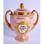 Late 19 th / early 20th c. Coalport two handled vase and cover painted with flowers in gilt panel o