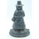 Vintage cast iron door stop in the form of a Welsh woman 33cm.
