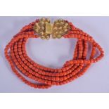 A LARGE 18CT GOLD CARVED CORAL NECKLACE. 289 grams. 45 cm long.