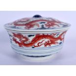 A CHINESE BLUE AND WHITE PORCELAIN BOWL AND COVER 20th Century, painted with dragons amongst clouds.