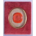 AN ANTIQUE VELVET CASED WAX SEAL depicting an emperor. Image 7 cm x 6 cm.