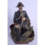AN ANTIQUE AUSTRIAN TOBACCO JAR AND COVER in the form of military male holding a sword. 24 cm high.