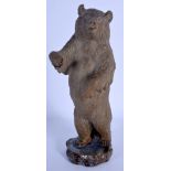 AN UNUSUAL CHINESE STONEWARE FIGURE OF A BEAR 20th Century. 24 cm high.