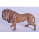 A CONTEMPORARY COLD PAINTED BRONZE LION. 9.5 cm wide.