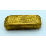 A small Chinese yellow metal bar 6.5 x 2.5cm .