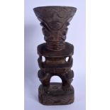 AN UNUSUAL TRIBAL MARQUESE ISLANDS CARVED WOOD FIGURE. 21 cm high.