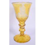 AN 18TH/19TH CENTURY BOHEMIAN GLASS GOBLET engraved with classical figures and scripture. 22 cm high