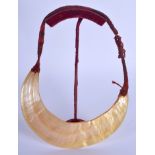 AN UNUSUAL PAPUA NEW GUINEA TRIBAL CARVED SHELL NECKLACE. 18 cm wide.