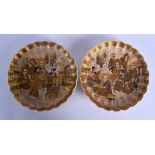 A PAIR OF 19TH CENTURY JAPANESE MEIJI PERIOD SCALLOPED SATSUMA PLATES painted with immortals. 18 cm