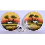 A RARE PAIR OF ROYAL ALBERT PORCELAIN DOG PLATES together with a bisque figure of a dog. Plate 21 cm