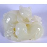A CHINESE CARVED WHITE JADE FIGURE OF TWO CATS 20th Century. 5 cm x 5.25 cm.