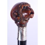 A RARE 18TH CENTURY CARVED FRUITWOOD ARTICULATED MONKEY WALKING CANE. 87 cm long.