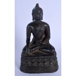 A 19TH CHINESE TIBETAN BRONZE BUDDHA modelled upon a triangular base. 16 cm x 9 cm.